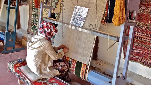 Carpet making by Turkey woman